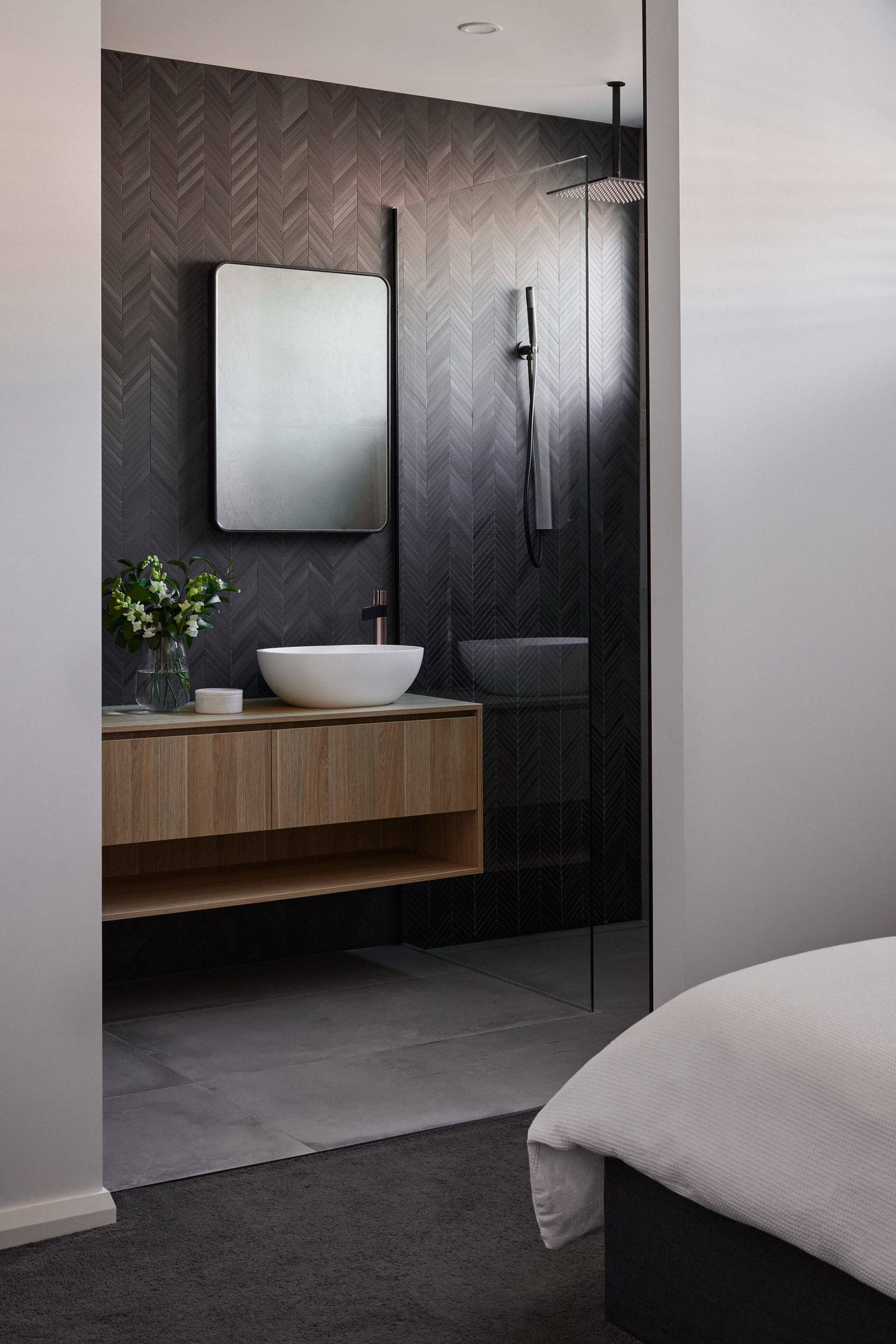 Project Amber, ensuite with dark herringbone tile feature wall