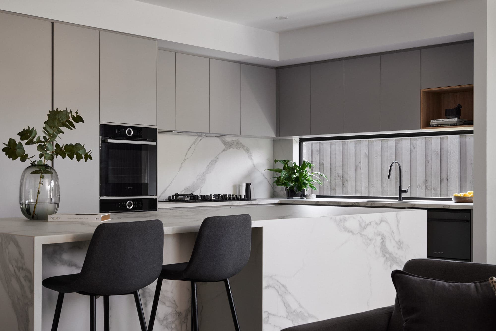 Project Amber, kitchen cooktop with marble splashback