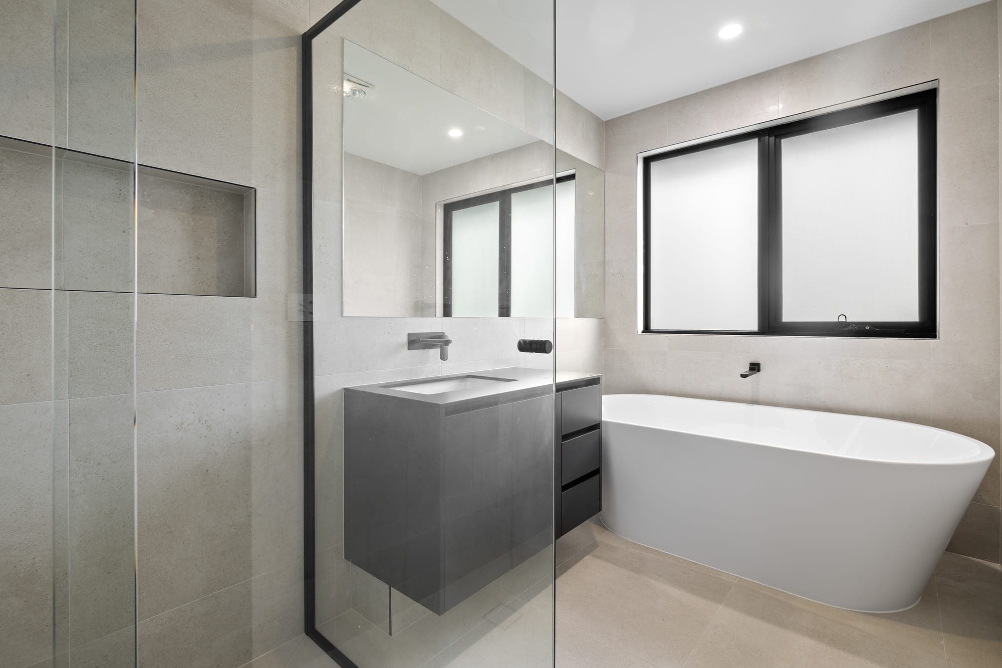 Project Solstice, ensuite with freestanding bath and tiled walls
