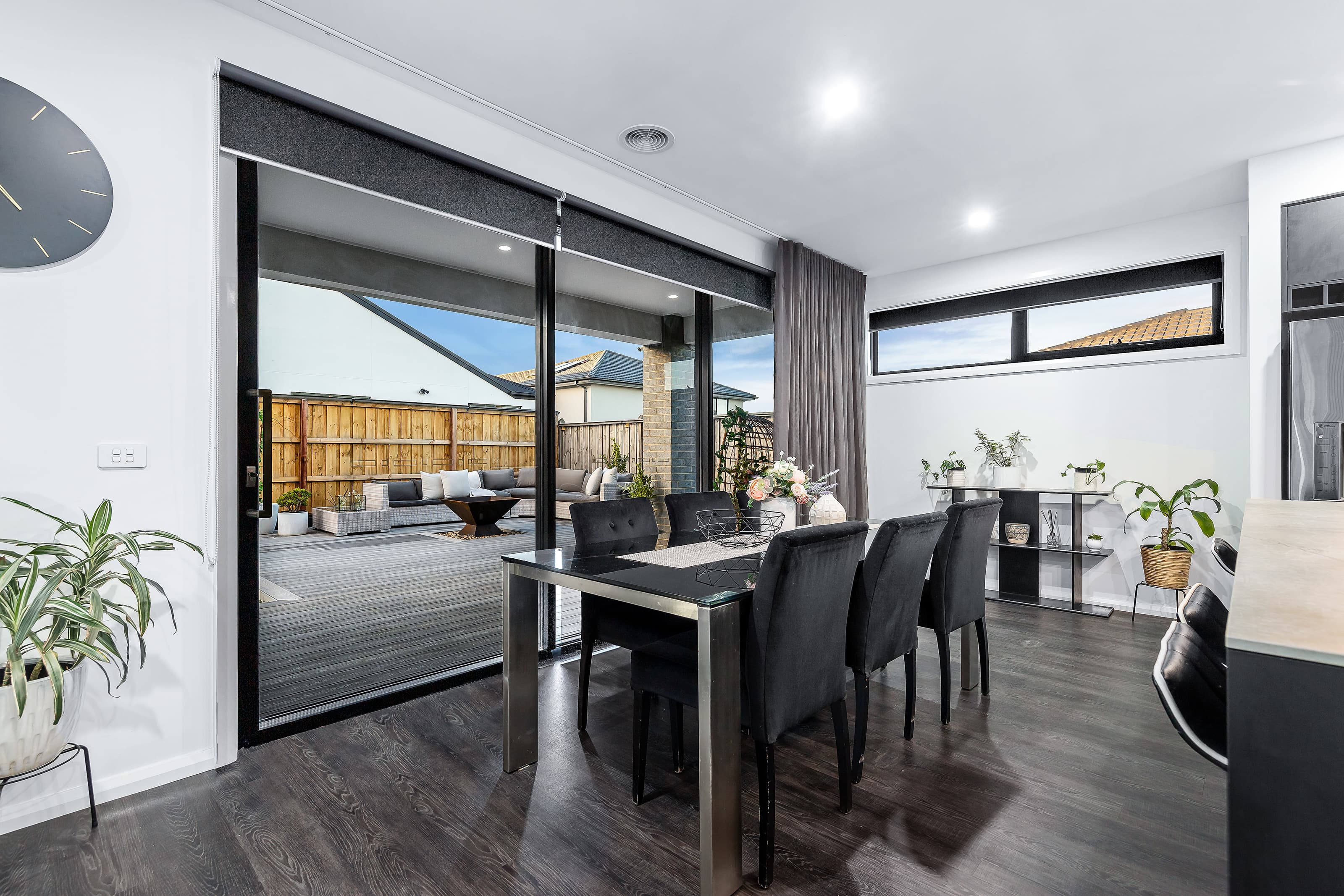 Contemporary multi-unit development with textured concrete and timber cladding by NE Homes
