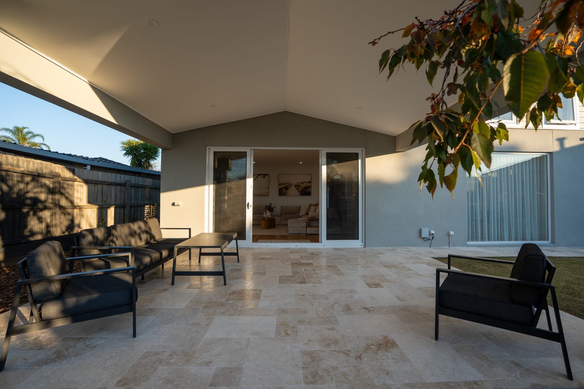 The Willow, alfresco with travertine pavers and garden, Rowville