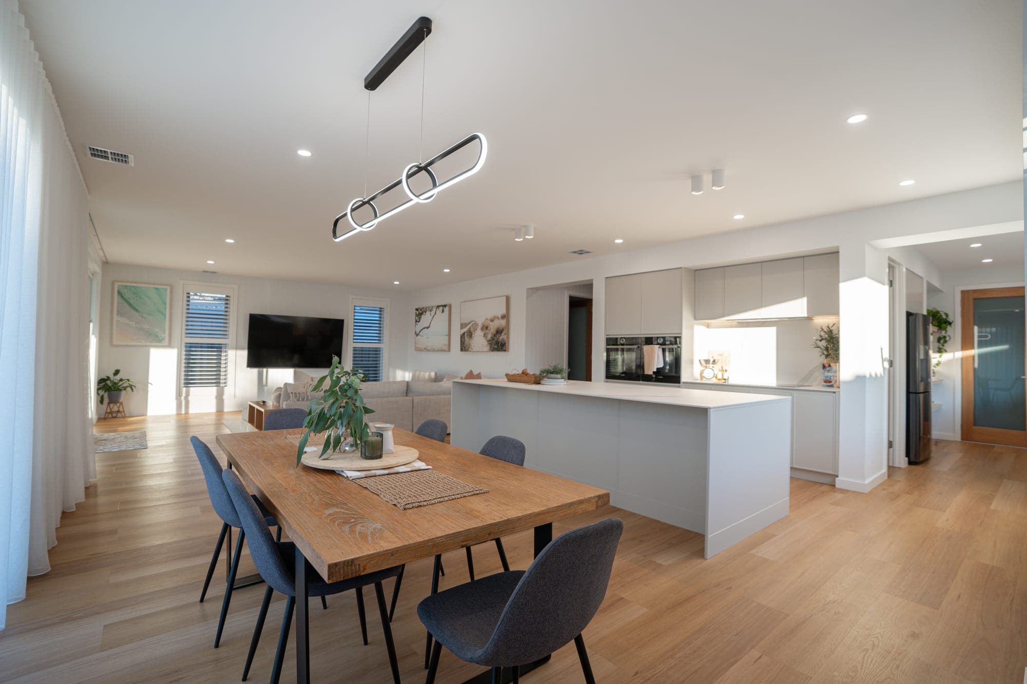 The Willow, kitchen and dining with timber table, Rowville
